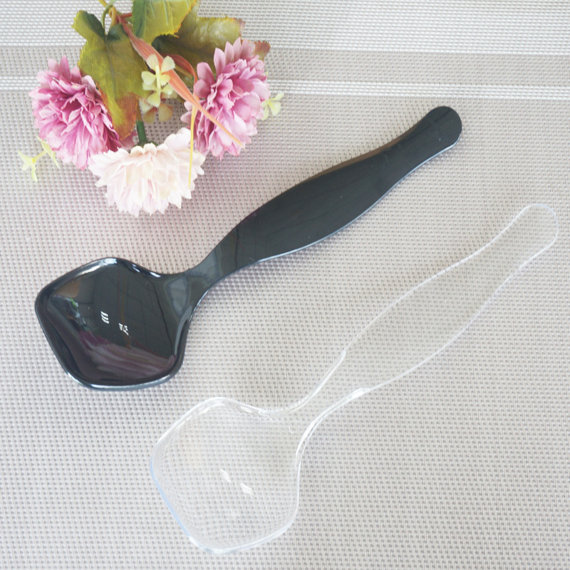 Plastic serving spoon